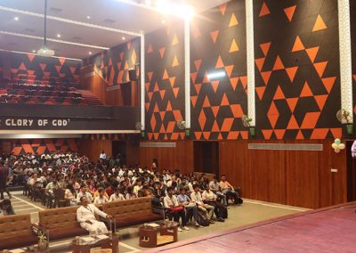 Rev. Fr. Georgish Britto, Director of Nav Jeevan Kendra, addressing from the podium at St. Xavier’s College, Jaipur.
